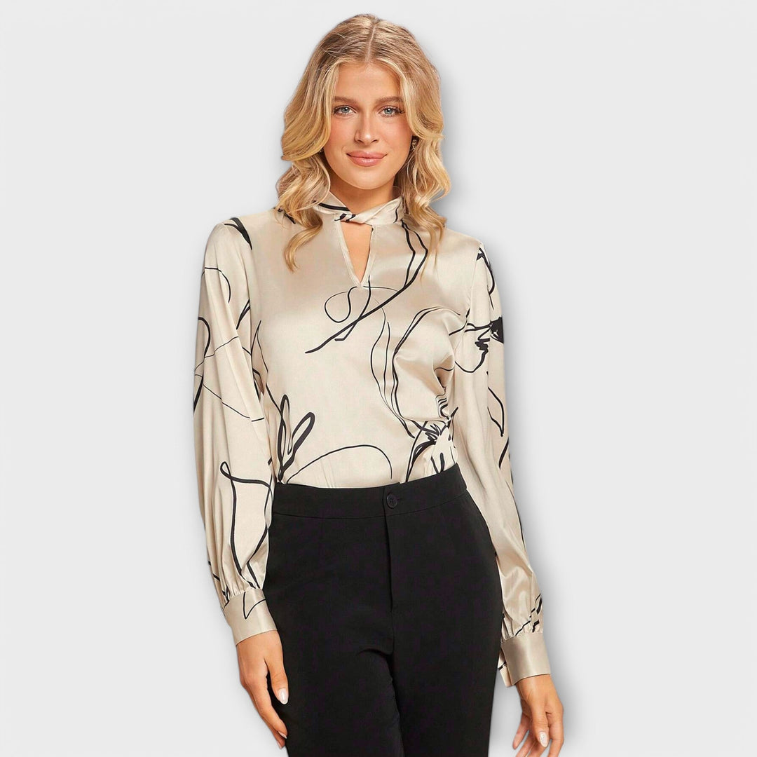 Elegant blouse with line pattern and keyhole detail