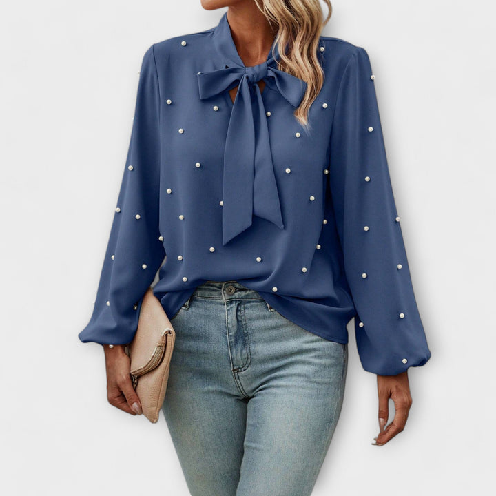 Sophia – Elegant blouse with pearl details and bow