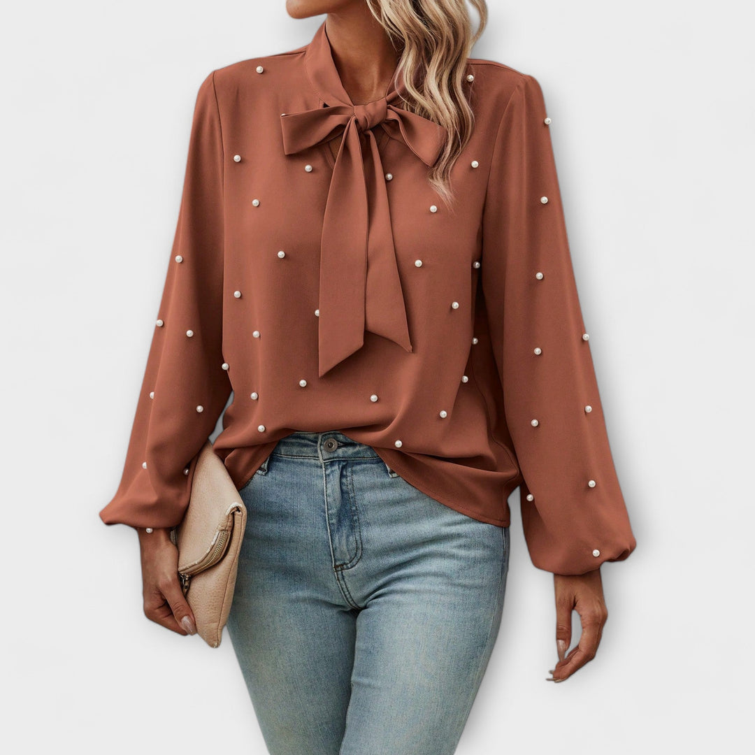 Sophia – Elegant blouse with pearl details and bow