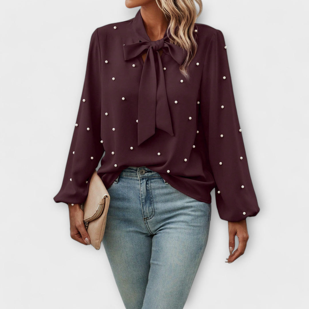 Sophia – Elegant blouse with pearl details and bow