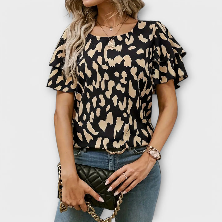 Lela – Stylish Blouse with Leopard Sleeves