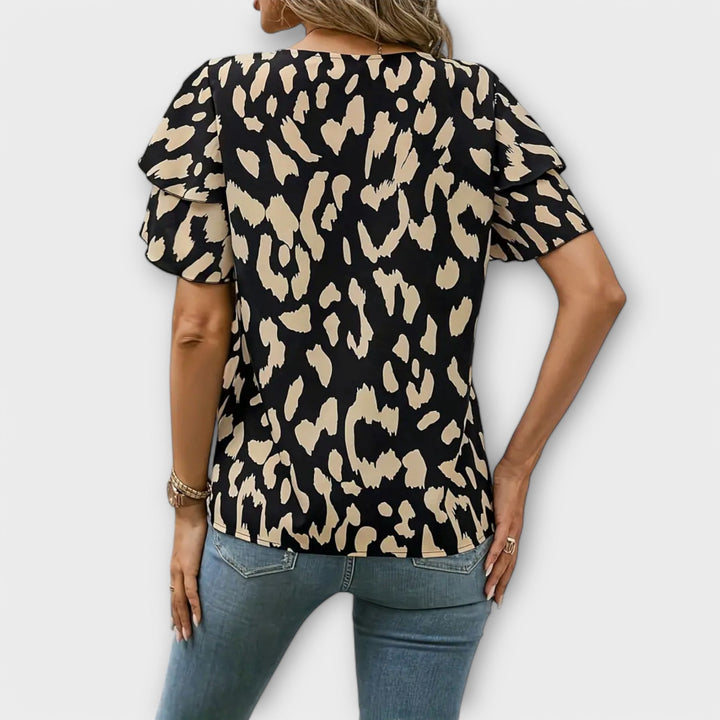 Lela – Stylish Blouse with Leopard Sleeves