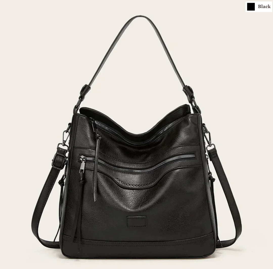 Malbjørg | Elegant shoulder bag with a wavy design