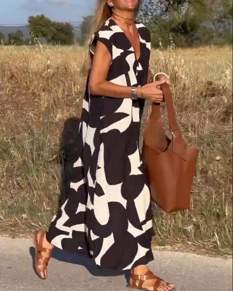 SITA - Dress with print and V-neckline